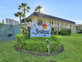 Peaceful condo with pool and brief walk to beach