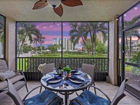 Spacious condo with lanai, pool and steps to beach