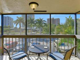 Inland condo with pool and steps to beach/food/shops