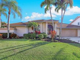Southern exposure waterfront home with pool and dock