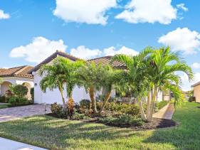 Modern waterfront home in Artesia with pool/gym