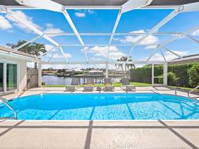 Direct boating access home in Olde Marco with pool