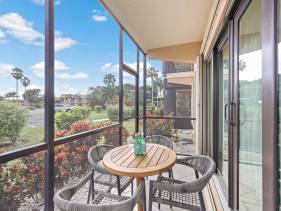 Peaceful condo with two pools/steps to beach and food
