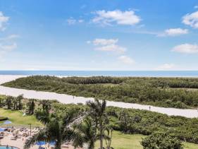 Beachfront condo with SW-facing balcony and pool