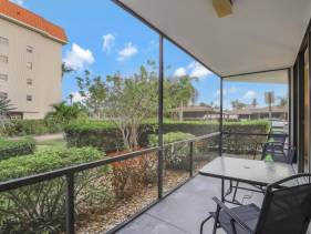 Peaceful condo with pool and steps to Tigertail Beach
