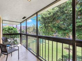 Charming condo with two pools and steps to beach