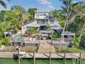 Unique waterfront home in Olde Marco with pool/deck