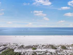 Beachfront condo with views, pools and tennis courts