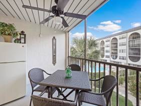 Tropical Condo on River with pools, spas, and tennis