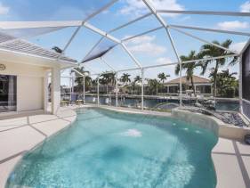 Waterfront home with pool table, heated pool and dock