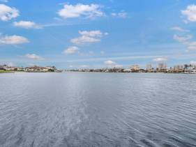 Opulent home with vast water view, pool and hot tub