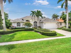 W exposure waterfront home with pool and dock