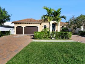 Waterfront home with pool, spa and outdoor kitchen
