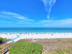Beachfront condo with restaurant, pool, spa and gym