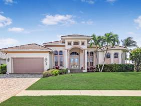 Beachy west exposure waterfront home with pool and spa