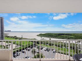 Two-balcony beachfront condo with pool/tennis/grills