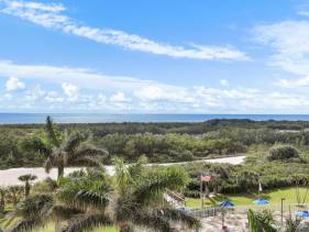 Beachfront condo with pool/views from two balconies