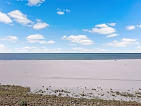 Modern 11th floor beachfront condo with views/pool