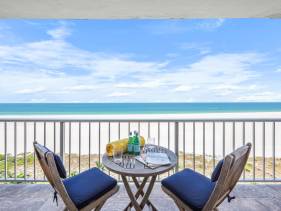 Breezy beachfront condo with panoramic beach view
