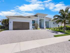 2023 custom built home with heated pool and hot tub