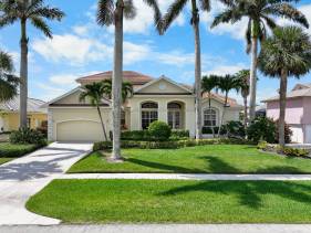 Beachy waterfront home with heated pool and S exposure