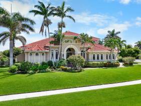 Waterfront home with heated pool, spa and walk to beach