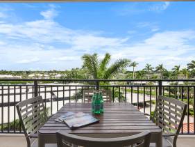 Inviting beachfront condo with large balcony and pool