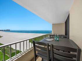 Penthouse beachfront condo with pool/fitness/grills