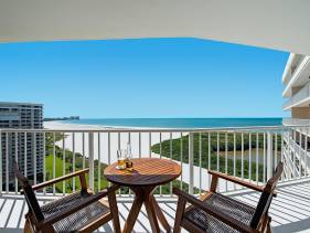 Coastal modern beachfront condo with sweeping views
