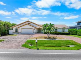 Pet-friendly waterfront home steps to beach/pool