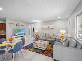 Peaceful condo with pool and steps to beach