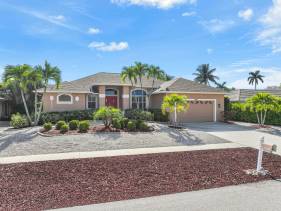 S exposure home with pool and walk to beach/food