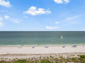 Beachfront condo with 180-degree views and pool
