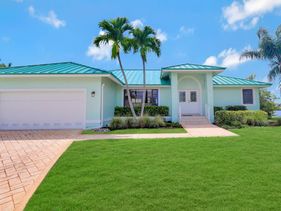 Pet-friendly waterfront home on key lot with view