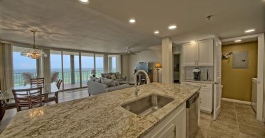 Modern remodeled kitchen with oversized island beautiful granite with views