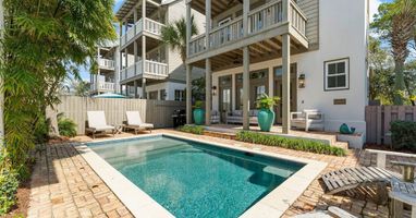 Raised 30A cottage with a private pool out front