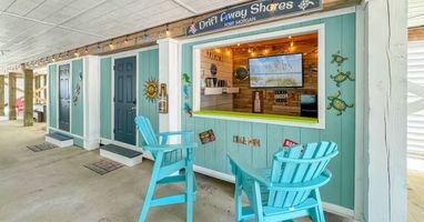 Hang out for hours of fun and relaxation by the covered Tiki Bar