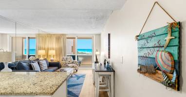 Coastal decor and breathtaking ocean views create a warm and inviting atmosphere. 