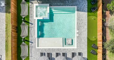 Poolside Hammocks, luxury lounges & umbrellas, poolside putting green