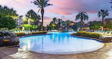 Your family's private resort right in the neighborhood. The lagoon pool is a few steps from the front door.