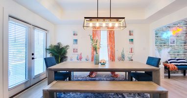 Huge Dining Room with Comfortable Seating for a Large Group, Ideal for Family Meals, Celebrations, and Group Gatherings