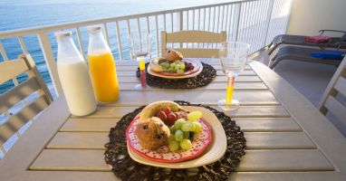 Enjoy a meal from this breathtaking balcony view!