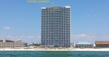 View from beach showing condo is on the top floor for magnificent views!