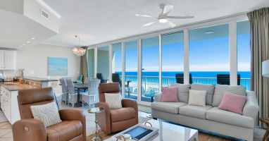 Living area with queen sleeper sofa, another sofa &amp; two leather swivel, rocker recliners. 