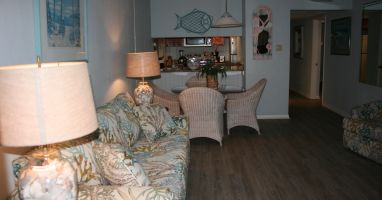 Living room with beach view, new floor and furnishings