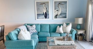 LIVING ROOM WITH QUEEN SLEEPER SOFA