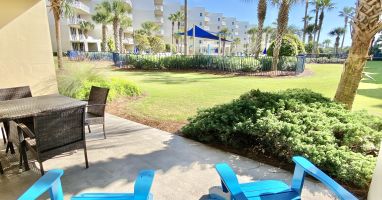 Great view and grass area from C204 patio with direct access to upper pools