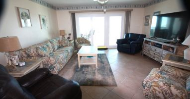 View of living room taken by dining area