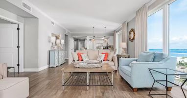 This beautifully renovated 12th floor unit impresses from end to end with its floor-to-ceiling windows throughout