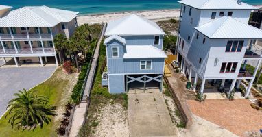 Gulf-front 4 bed / 3.5 bath with private boardwalk and parking for 4 vehicles